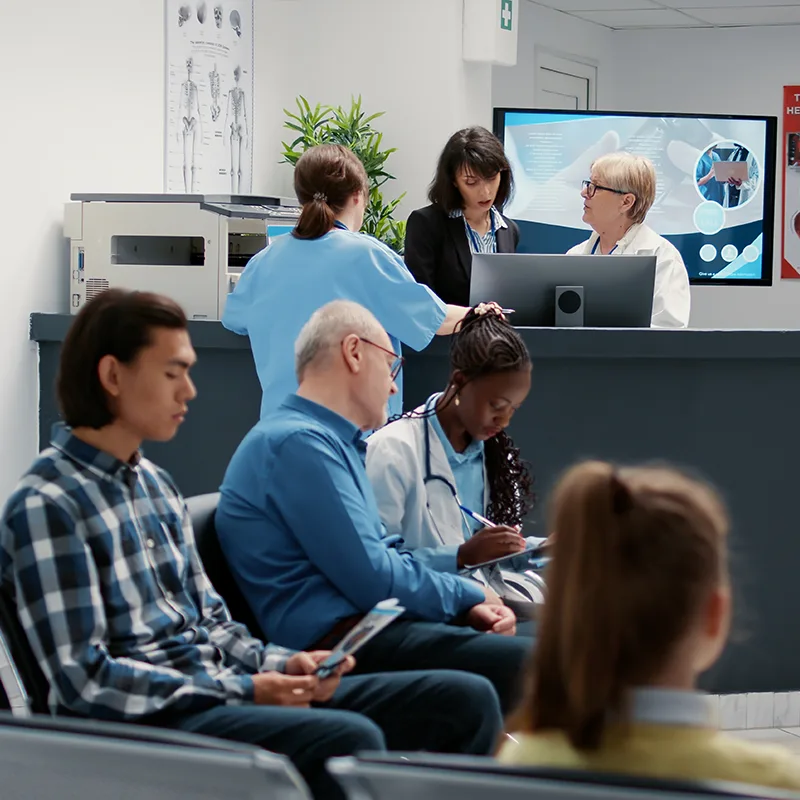 A busy NHS hospital reception